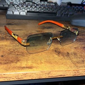 GREEN FRAMELESS SUNGLASSES